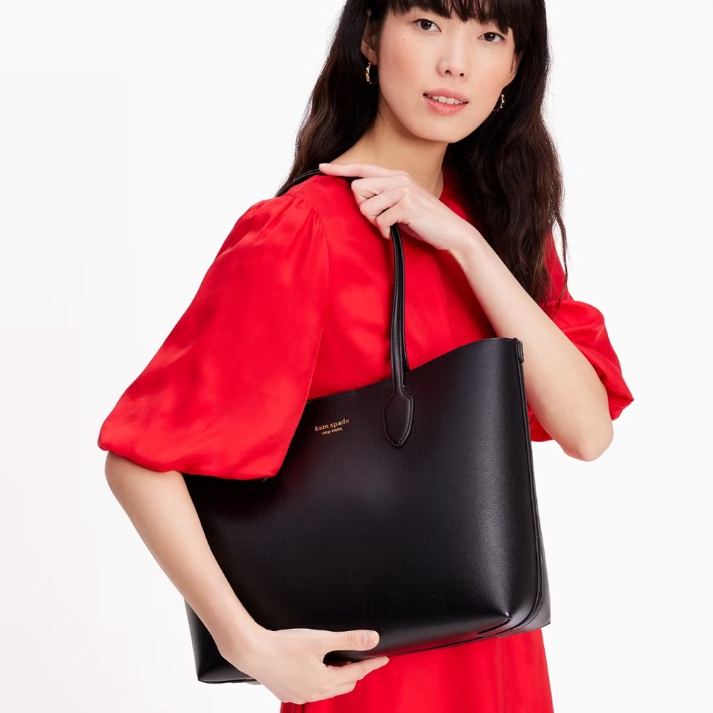 Kate spade black leather tote in excellent condition, used once
